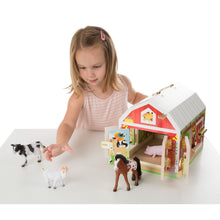 Girl using barn set