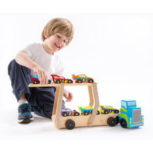 Boy playing with race cars