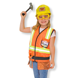 Girl wearing construction work costume