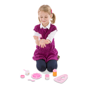 girl with doll feeding set