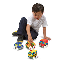 Boy playing with cars