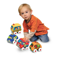 Boy playing with cars