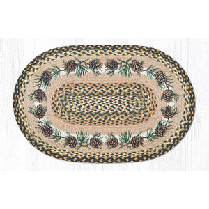 Braided rug with pine cone motifs