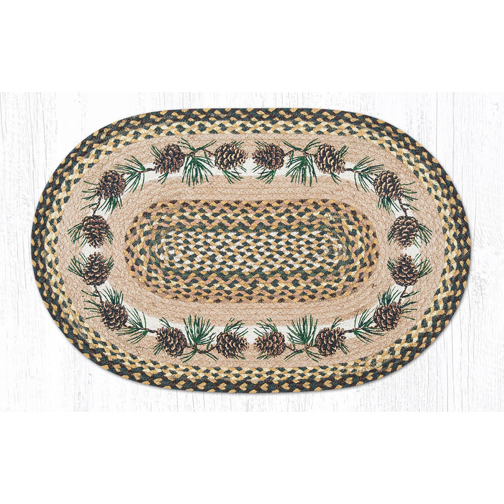 Braided rug with pine cone motifs