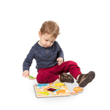 Child playing with puzzle
