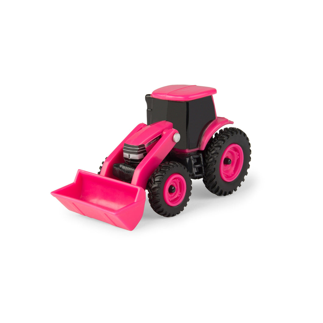 Small pink toy tractor