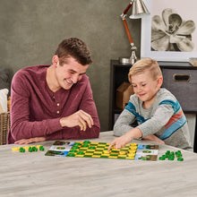 Father and son playing checkers