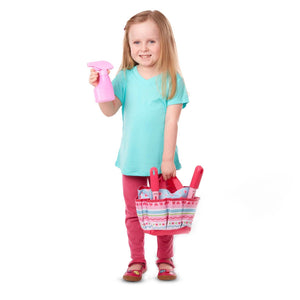 Child holding spray bottle