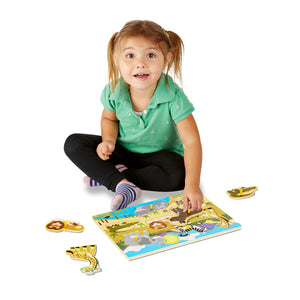 Girl playing with puzzle