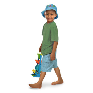 Boy holding sand toy