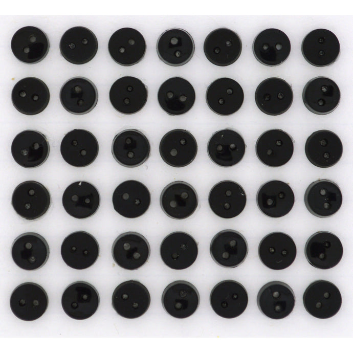 Tiny black buttons